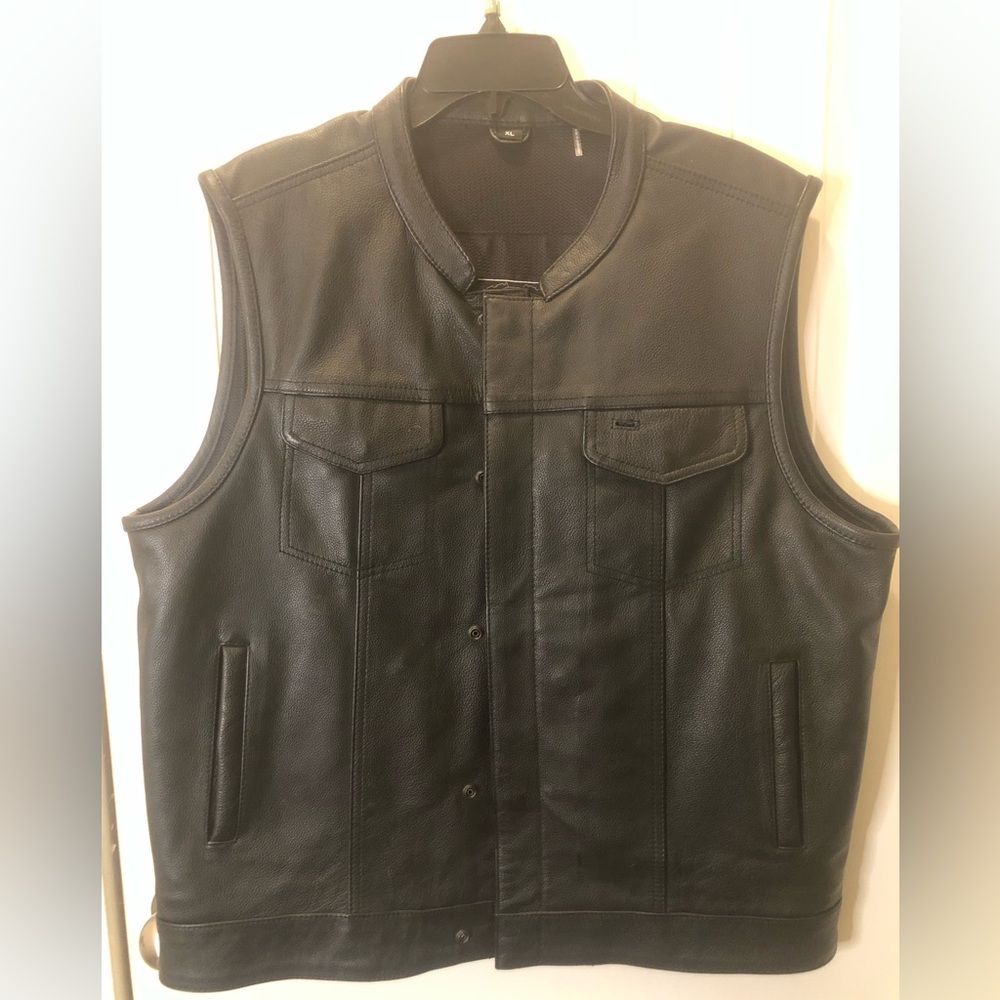 Selling black leather vest by First MFG